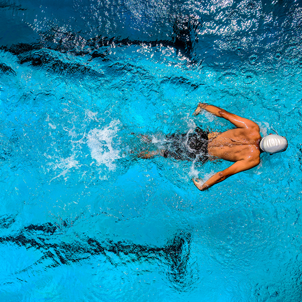 Swimmer in pool with swimcap